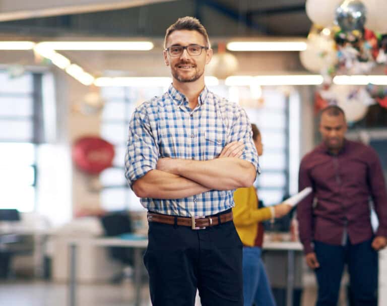 photo-of-confident-man-looking-at-camera-with-arms-crossed-confidently