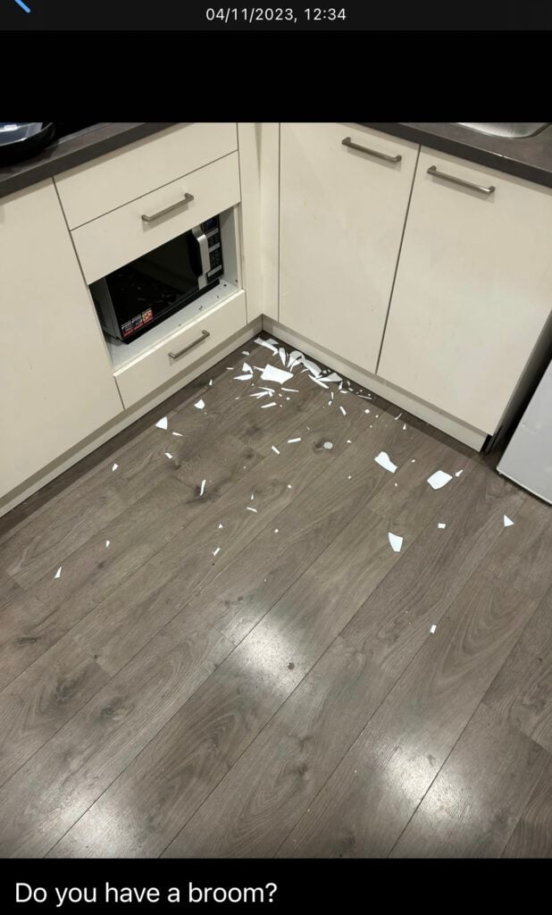 screenshot-of-photo-message-of-smashed-plate-on-student-kitchen-floor