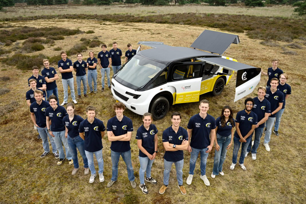 solar-team-eindhoven-standing-around-stella-juva-electric-solar-powered-ambulance
