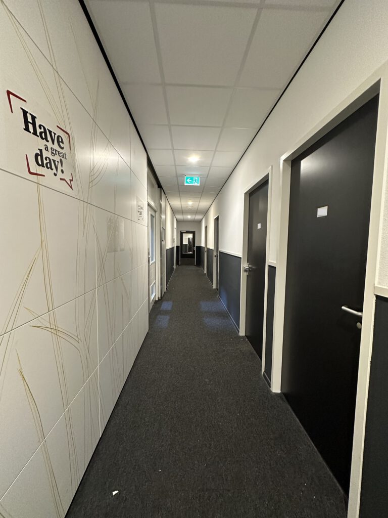photo-of-doors-lining-corridor-in-student-accommodation