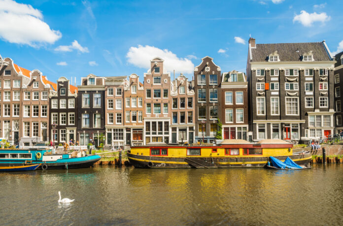 view-of-amsterdam-houses-on-sunny-day-netherlands