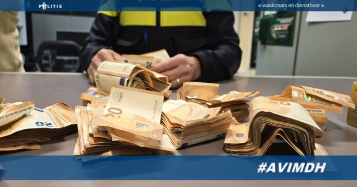 photo-of-stacks-of-fifty-euro-notes-found-in-suspicious-street-seller-case