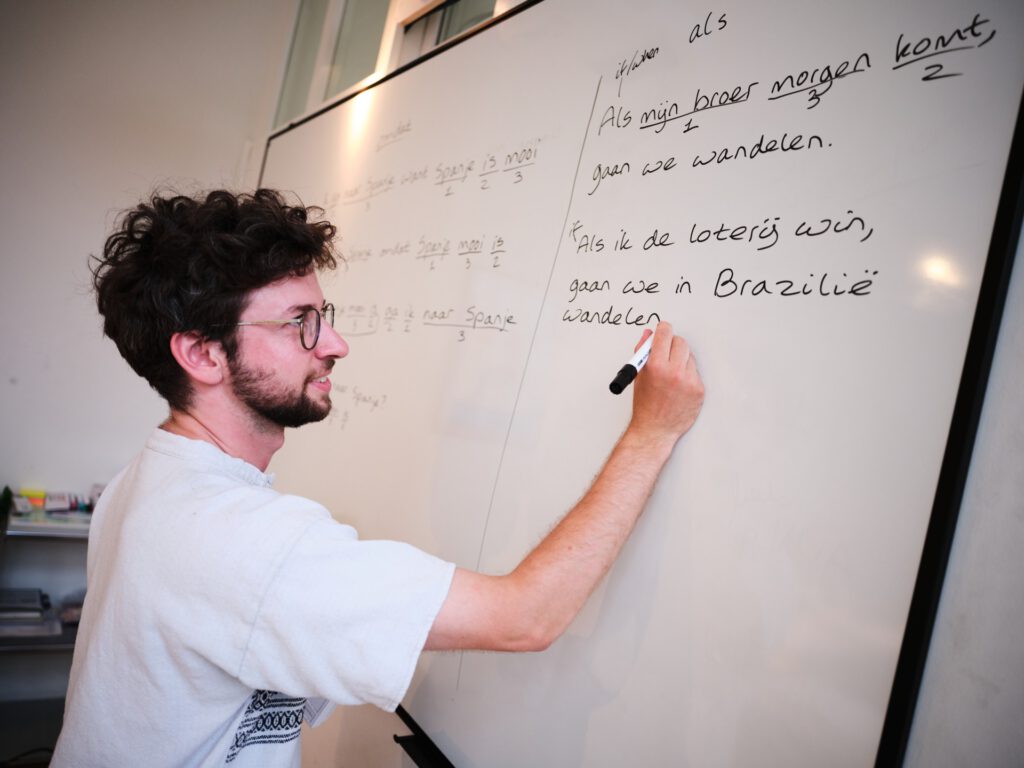 photo-of-teacher-writing-on-whiteboard-at-dca
