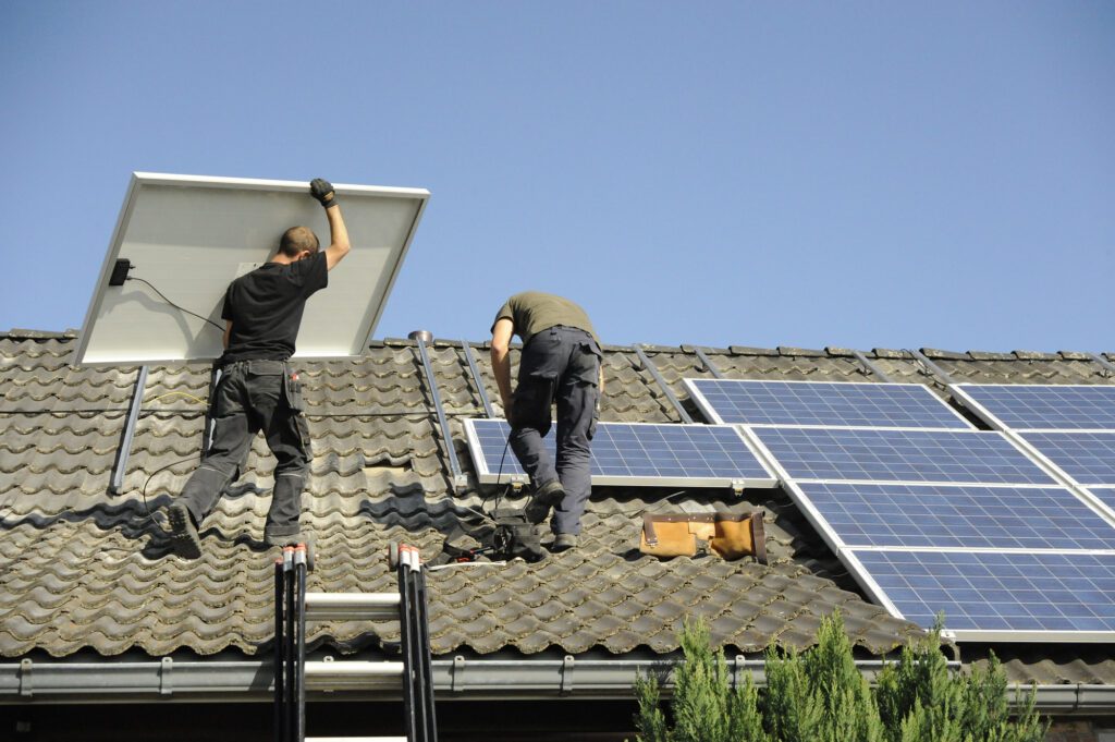 technicians-installing-solar-panels-on-roof-in-the-netherlands
