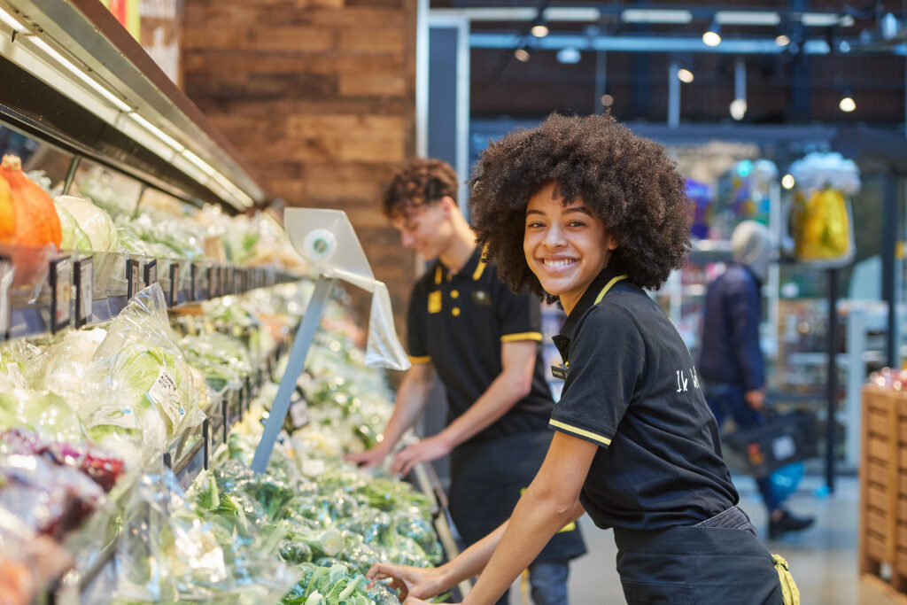 teenage-girl-working-at-jumbo-supermarket-in-the-netherlands