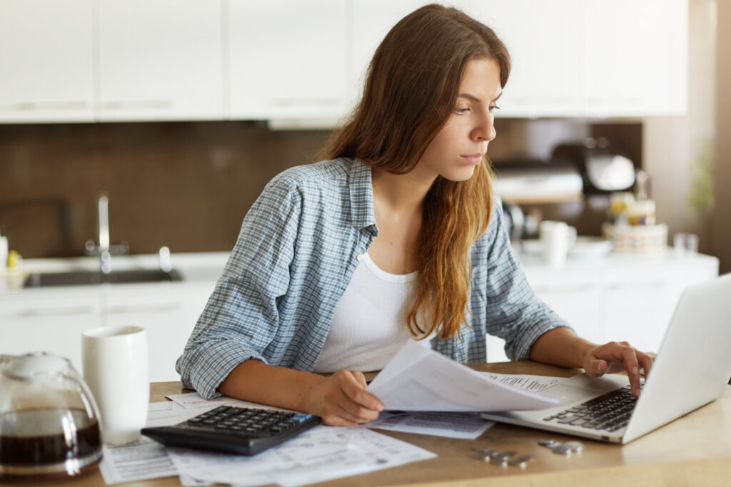 photo-of-woman-looking-at-finances-while-doing-taxes-in-the-Netherlands