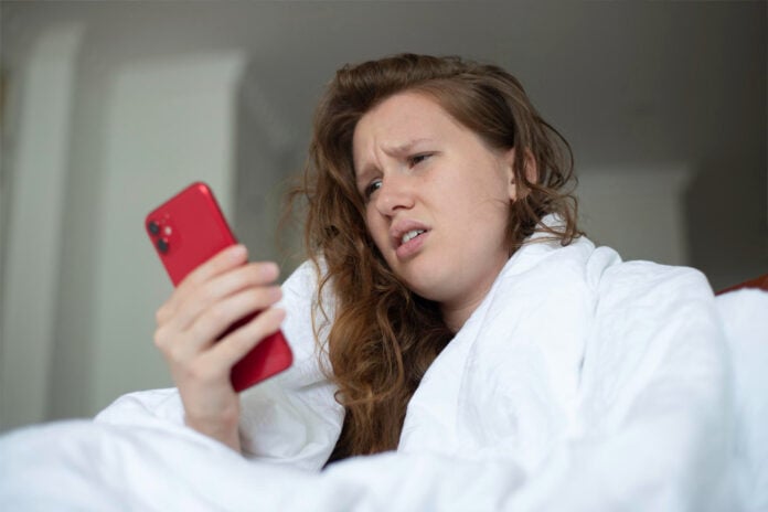 photo-of-frustrated-sick-woman-trying-to-phone-doctore