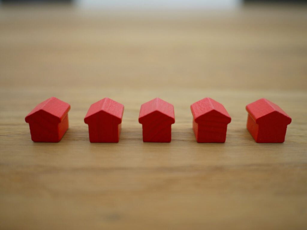 photo-of-wooden-houses-on-table-rent