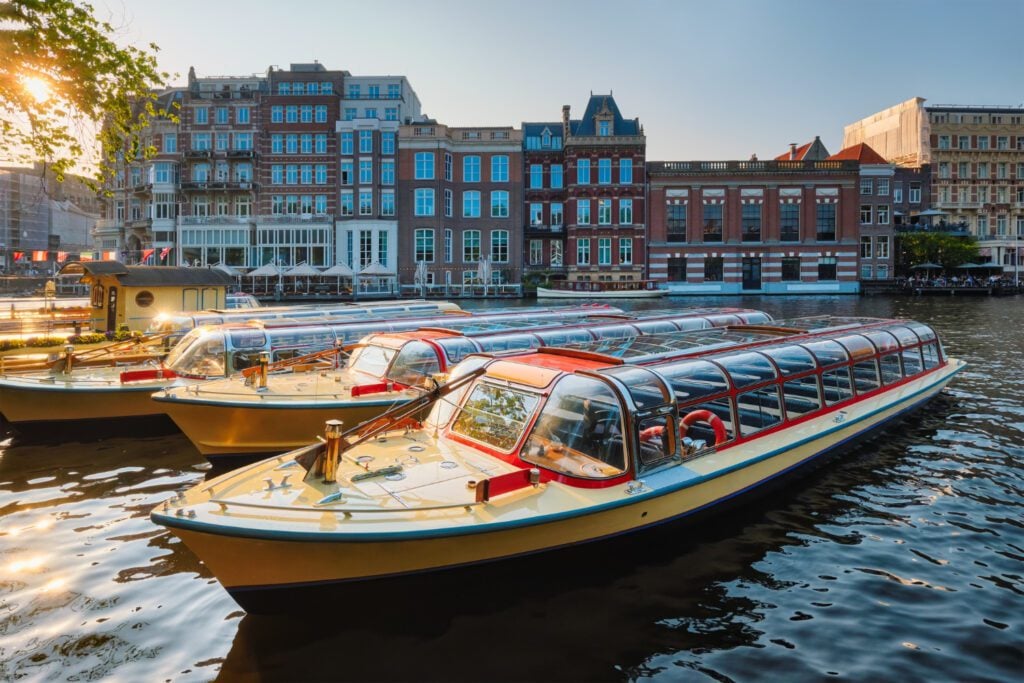 photo-of-typical-tourist-boat-moored-in-amsterdam-harbour