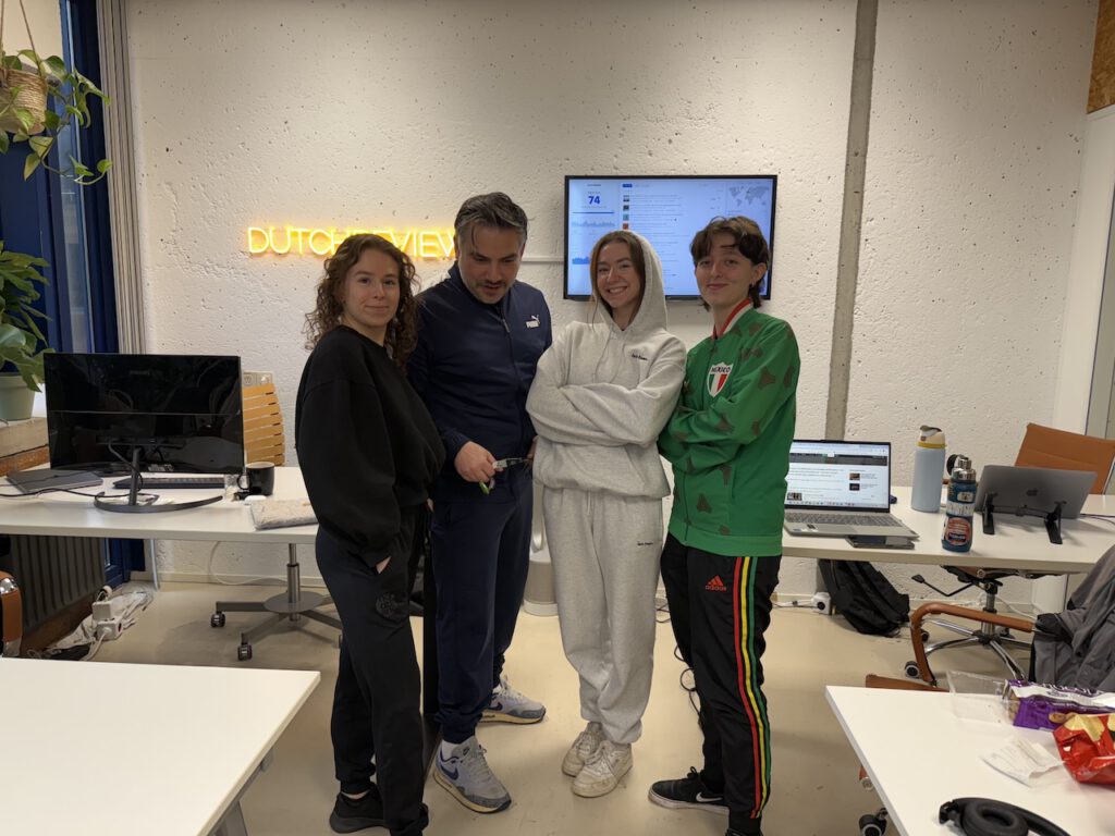 photo-of-DutchReview-team-wearing-tracksuits-in-office