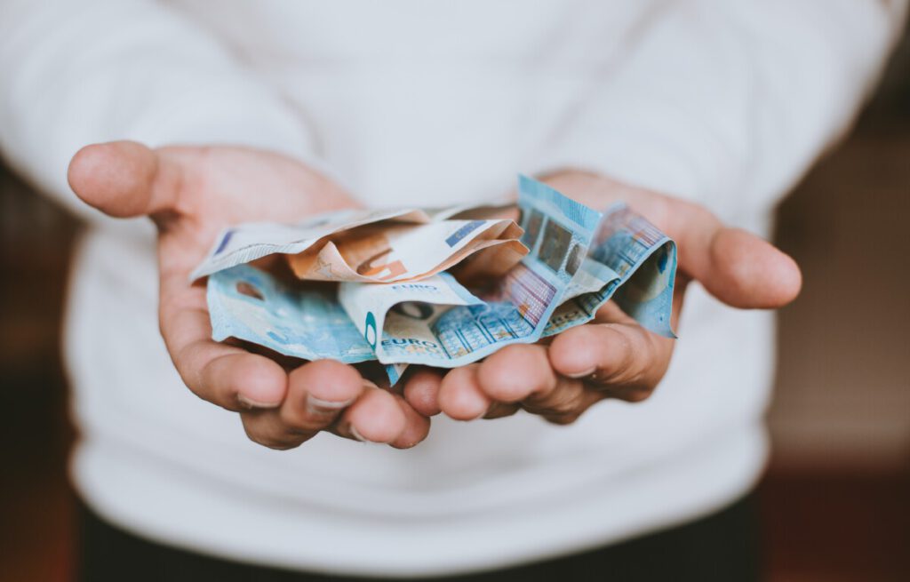 photo-of-girl-holding-euro-banknotes-for-netherlands-currency-in-hands