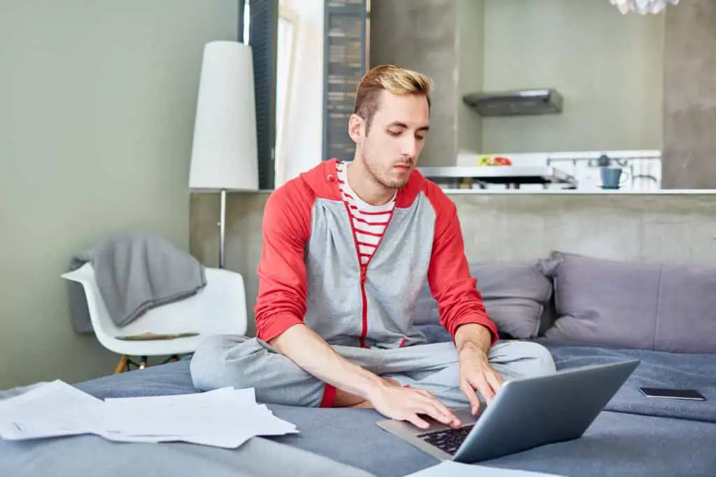 ukrainian-man-opening-dutch-bank-account-with-ing-online-necessary-paperwork-beside-him