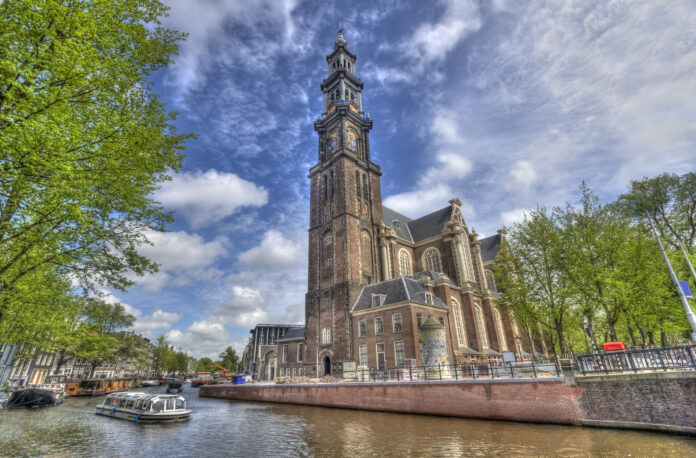 westerkerk-with-westertoren-in-jordaan-amsterdam-photographed-from-canal