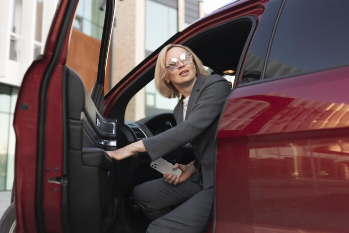 woman-getting-out-of-car-before-learning-about-dutch-reach-to-open-car-door
