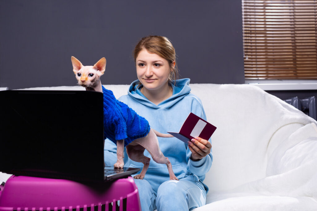 woman-holding-passport-with-pet-on-her-lap-in-the-netherlands