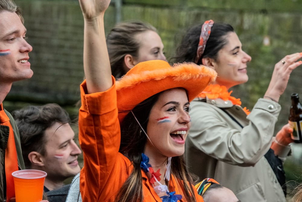 picture-of-a-woman-in-orange-clothing-celebrating-Dutch-kingsday