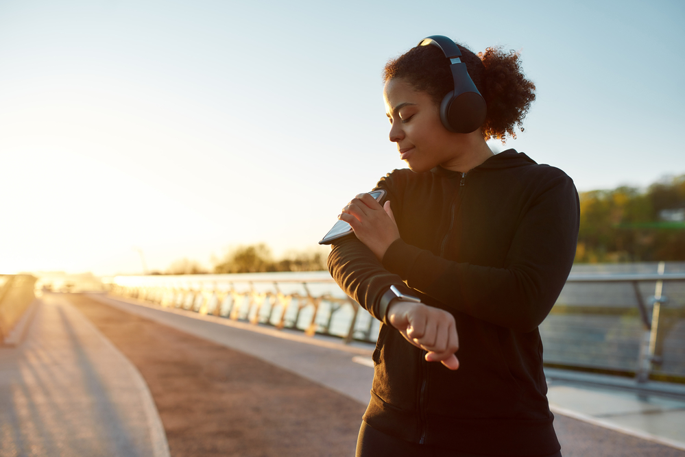 
woman-in-the-netherlands-on-run-listening-to-podcast-to-save-time