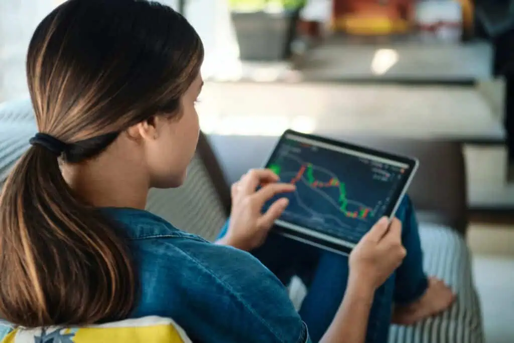 woman-looking-at-stocks-on-ipad
