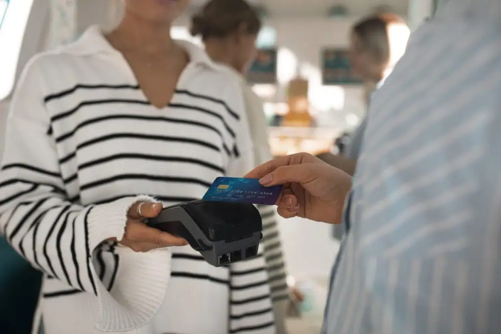 woman-paying-with-foreign-ukrainian-bank-card-at-cafe-in-the-netherlands
