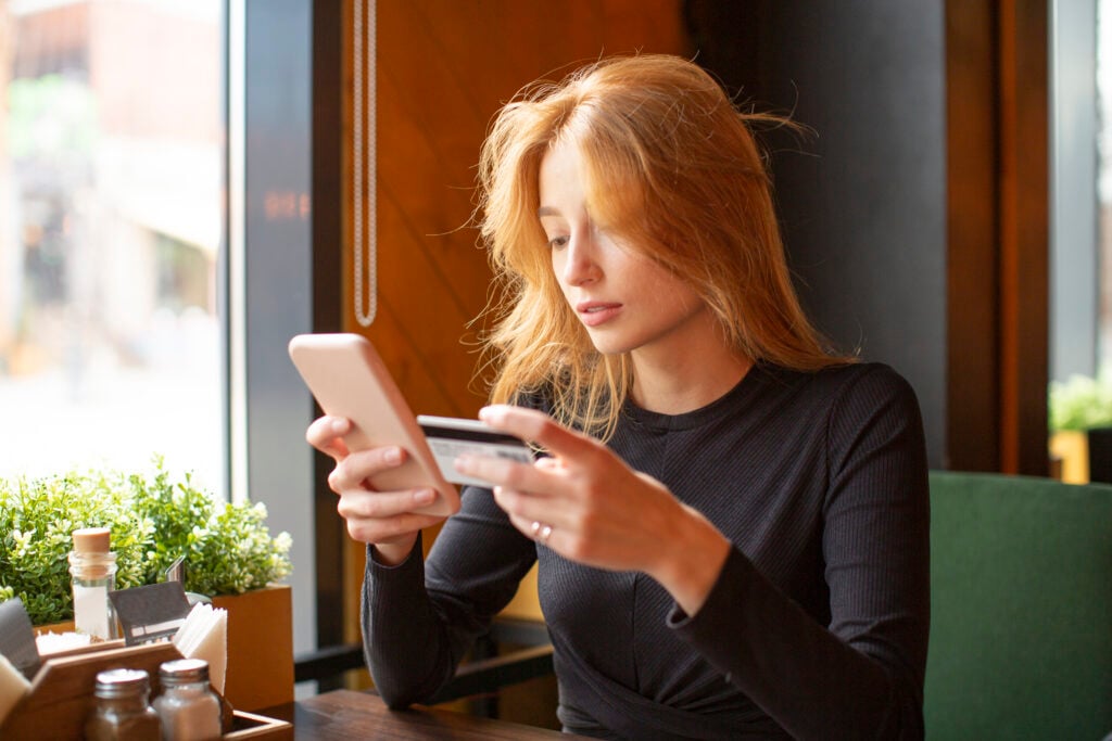 woman-paying-with-her-mobile-banking-app-netherlands