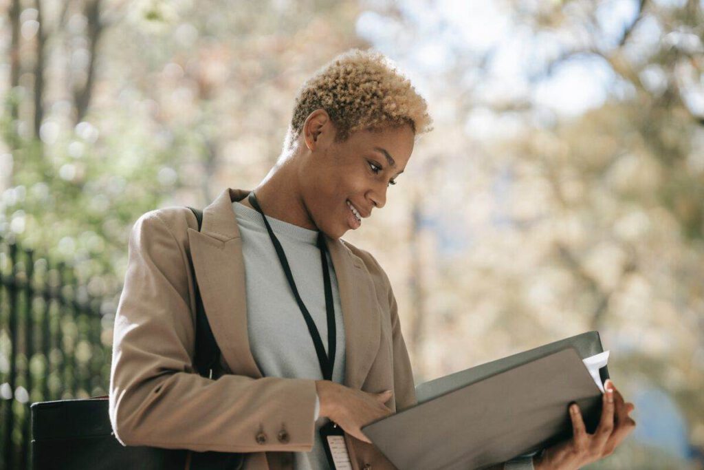 photo-of-woman-outside-looking-at-dutch-employment-contract