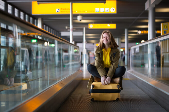 woman-travelling-within-schiphol-airport-in-the-netherlands
