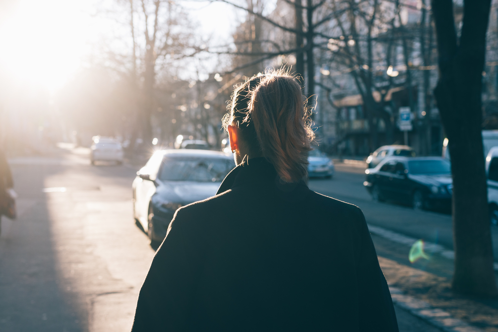 woman-walking-in-dutch-city-during-the-cold-months-dealing-with-seasonal-affective-disorder