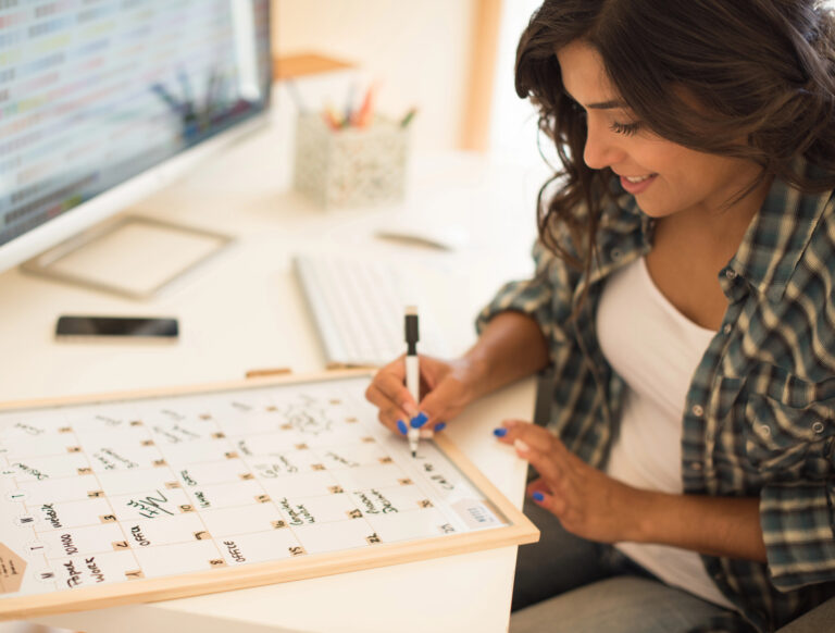 photo-of-woman-writing-down-important-financial-dates-in-the-netherlands