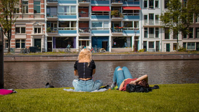 photo-of-two-women-relaxing-in-amsterdam