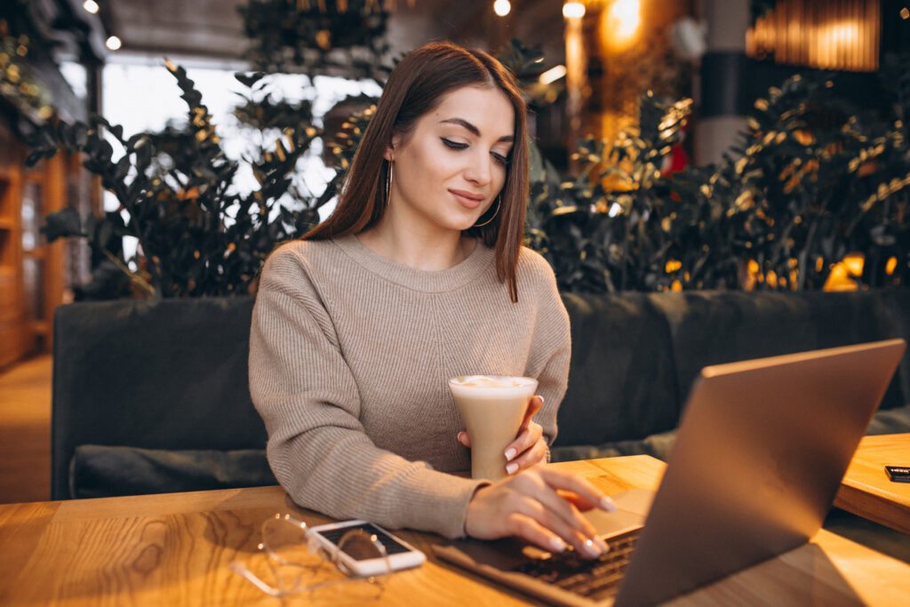 young-woman-working-in-cafe-in-eindhoven-surrounded-by-plants