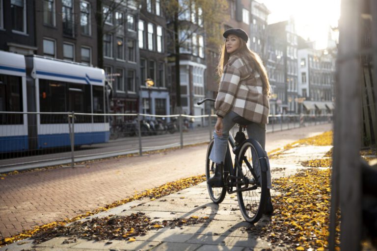 young-woman-cycling-with-ebike-from-Upway-in-amsterdam